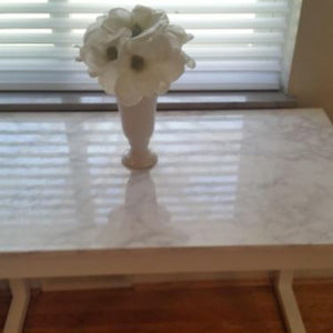 I was able to transform a flimsy $15 desk into a beautiful piece. The color and veining of the marble ...